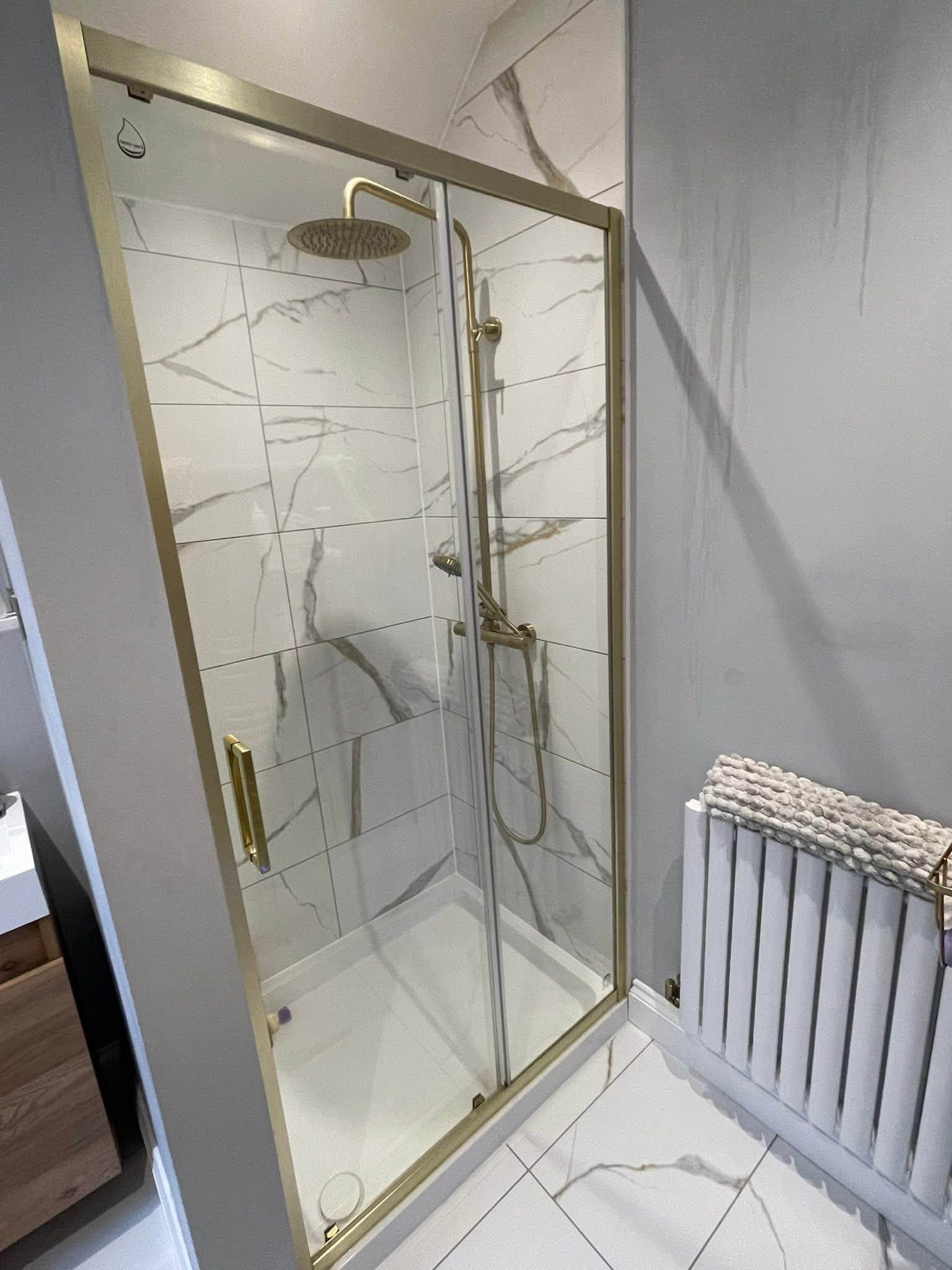 A clean glass shower enclosure