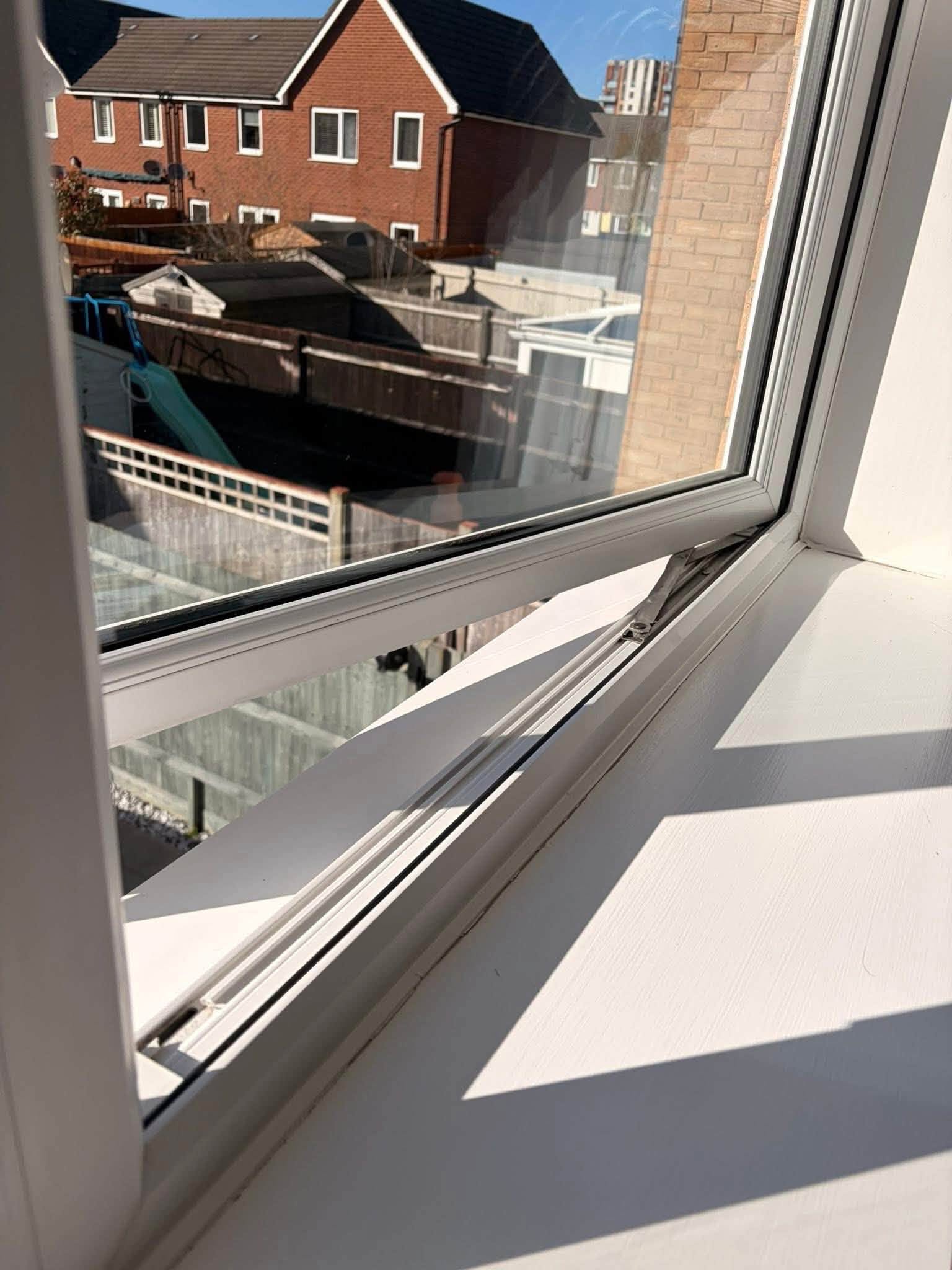 A cleaned windowsill and window